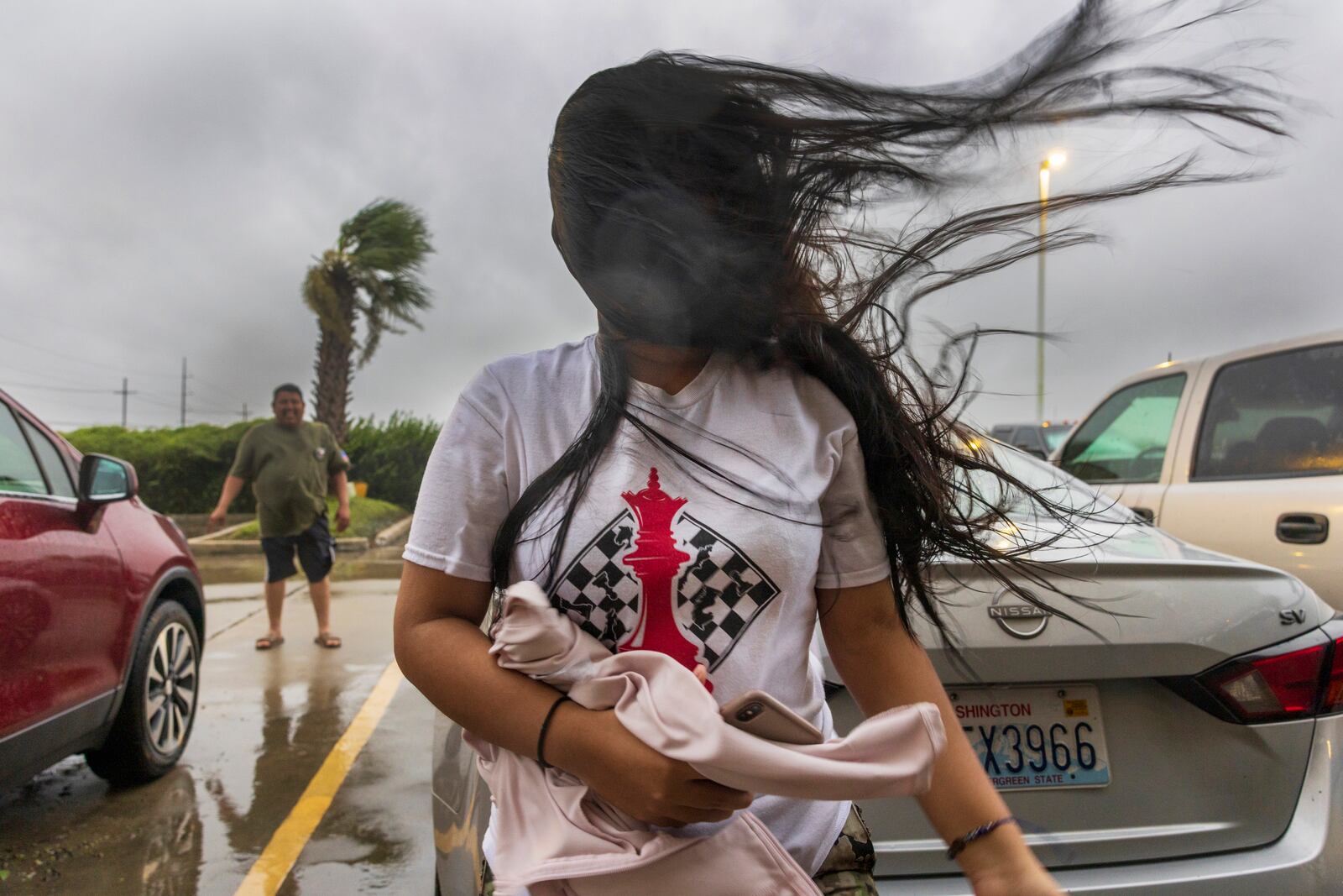 Melanie Galindo's hair flies in the swirl of fast-moving air as the eye wall of Hurricane Francine crosses into the Houma area in Louisiana on Wednesday, September 11, 2024. (Chris Granger, The Times-Picayune via AP)