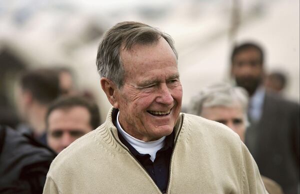 President George Bush visits a tent camp for earthquake survivors on the outskirts of Islamabad on January 17, 2006 in Pakistan. Bush, 81, came as a special envoy for the United Nations to speak with survivors of the October 8 earthquake that killed more than 75,000 people and left another 3.5 million homeless. He had been scheduled to visit the earthquake zone, but helicopter flights to the area were grounded because of bad weather.