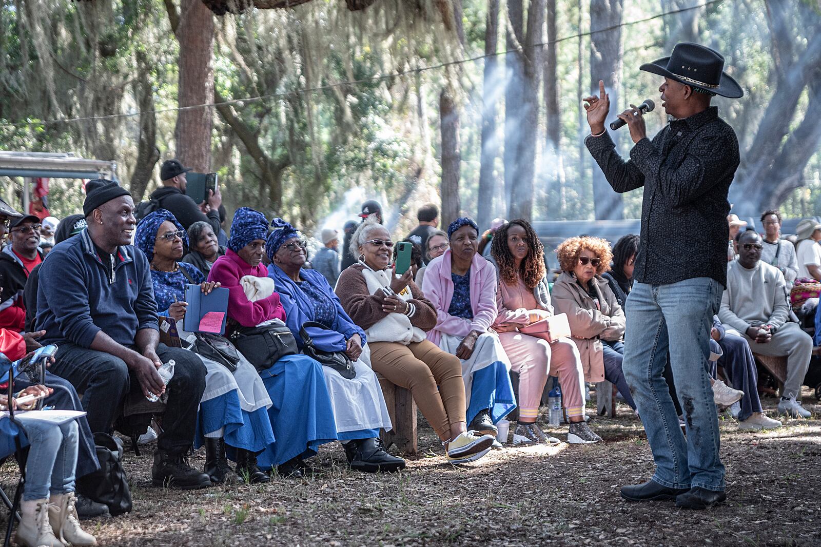 Jamal Touré, a historian, scholar and activist, delivers a spirited speech at the Sapelo Island Cultural Day.  Crowds attended the annual celebration by the Sapelo island’s tiny Gullah-Geechee community of Black slave descendants on Saturday, Oct. 19, 2024. After the celebration, seven people were killed when part of a ferry dock collapsed. (Teake Zuidema)