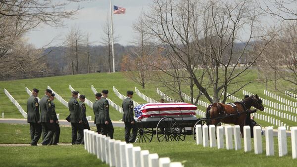 FILE - In this April 13, 2009, file photo, a single-horse caisson carries the casket of Lloyd Stidham to his grave-side service at Camp Nelson National Cemetery in Camp Nelson, Ky. U.S. Interior Secretary Ryan Zinke is recommending President Donald Trump create three new monuments, of which Camp Nelson is one, in Montana, Kentucky and Mississippi. (David Stephenson/Lexington Herald-Leader via AP, File)