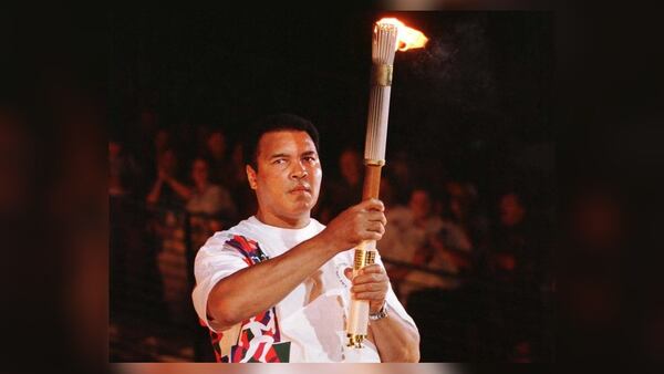 Muhammad Ali lit the cauldron at the opening ceremonies for the 1996 Olympic Games in Atlanta. (Andy Clark / Reuters)