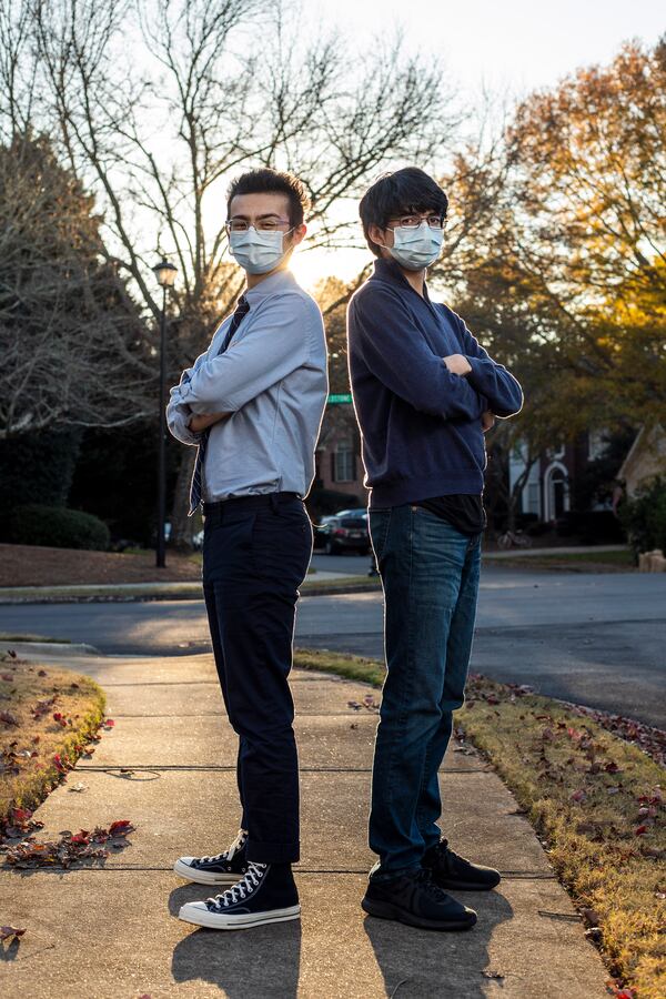 Seventeen-year-old Edward Aguilar, left, and 18-year-old Michael Giusto are co-founders of Students for Tomorrow. (Alyssa Pointer / Alyssa.Pointer@ajc.com)