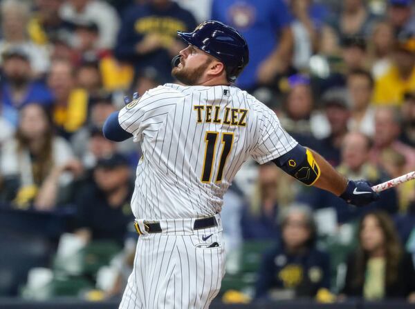 Milwaukee Brewers first baseman Rowdy Tellez (11) hits a two-run homer in the seventh inning.  Curtis Compton / Curtis.Compton@ajc.com 