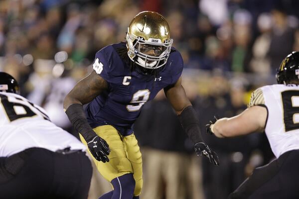 Notre Dame linebacker Jaylon Smith (9) was injured in his final game with the Irish in the Fiesta Bowl. He goes for his medical re-check on Thursday and Friday in Indianapolis. (Michael Conroy | Associated Press)