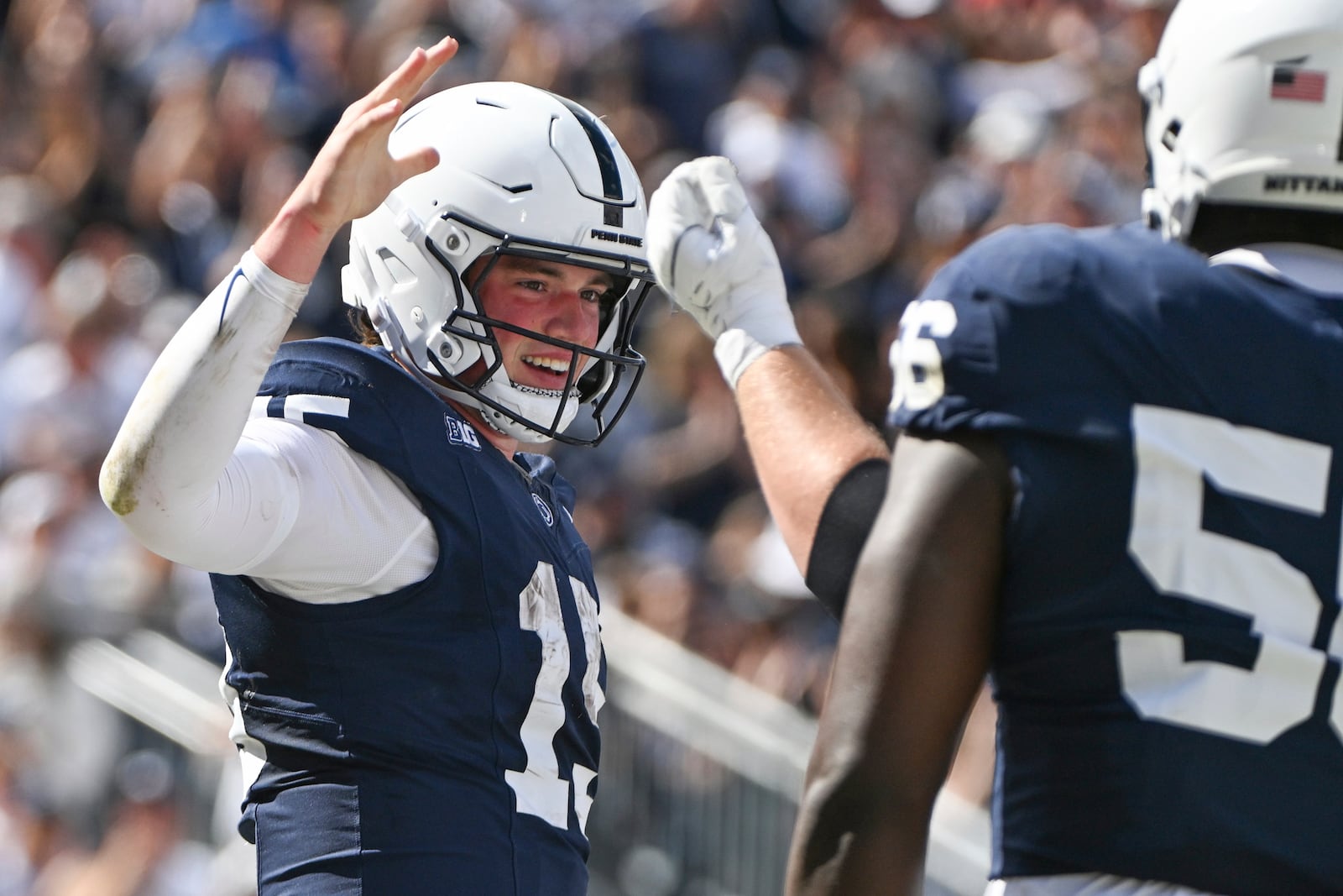 Penn State quarterback Drew Allar (15) celebrates a touchdown during the first half of an NCAA college football game against UCLA Saturday, Oct. 5, 2024, in State College, Pa. (AP Photo/Barry Reeger)