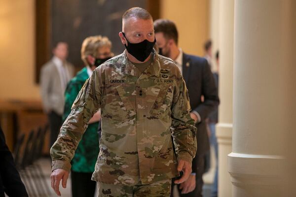 Georgia Department of Defense Adjutant General Thomas Carden makes his way to Gov. Brian Kemp’s office following a COVID-19 update Monday at the Capitol. The governor is preparing to call up as many as 2,500 additional National Guard troops to help hospitals struggling with a surge in new cases caused by the delta variant. (Alyssa Pointer/Atlanta Journal Constitution)