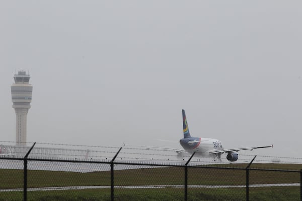 Planes take off and land at Hartsfield-Jackson International Airport in Atlanta on April 3, 2017. 