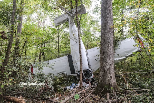 Two women were aboard a small plane that crashed into a wooded area off Tara Beach Lane late Tuesday night.