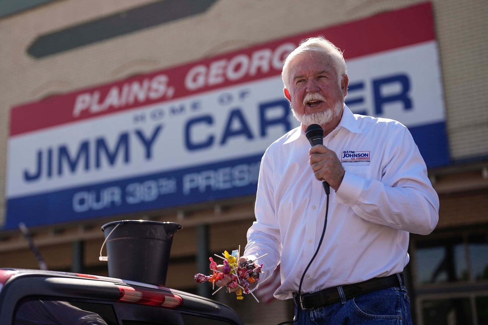 FILE - Wayne Johnson rides in the parade during the 26th annual Plains Peanut Festival, ahead of former President Jimmy Carter's birthday on Oct. 1, Saturday, Sept. 28, 2024, in Plains, Ga. (AP Photo/Mike Stewart, File)