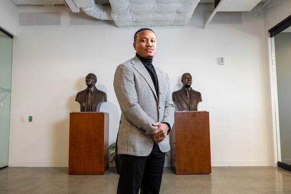 Ryan Smith, executive vice president of Atlanta Life Insurance Co., poses for a portrait inside the company's headquarters at the Bank of America Plaza in Atlanta on Wednesday, Jan. 29, 2025. (Arvin Temkar/AJC)