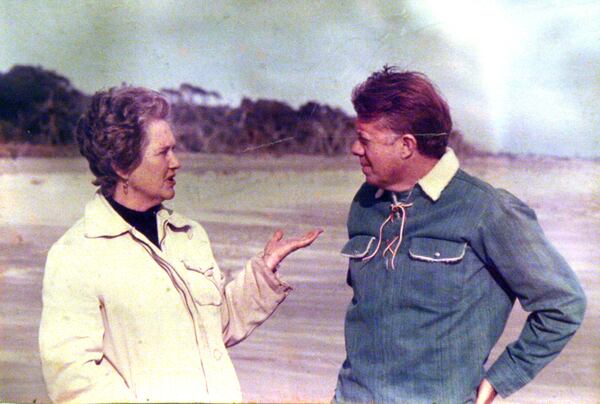 This is a copy of a family photo showing Eleanor Torrey " Sandy" West, with then Georgia Gov. Jimmy Carter on the beach at Ossabaw Island. WEST FAMILY PHOTO