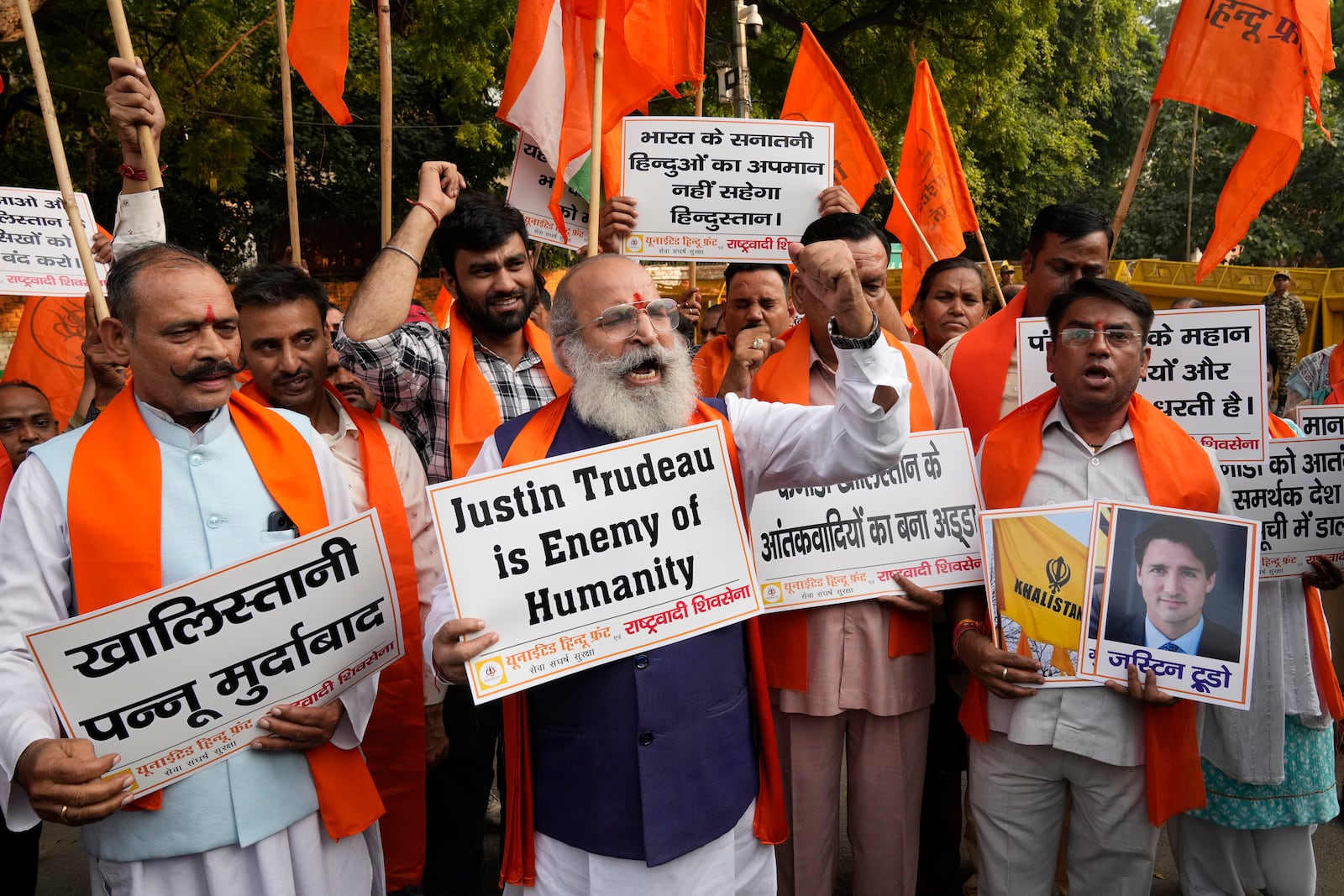 Activists of United Hindu Front, a right wing group reacting to Canada’s allegation that Indian Home Minister Amit Shah ordered the targeting of Sikh activists inside Canada, hold placards during a protest in New Delhi, India, Tuesday, Nov. 5, 2024. (AP Photo/Manish Swarup)