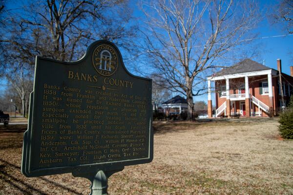 A historical marker is displayed in downtown Homer in Banks County. Donald Trump won nearly nine out of 10 voters in the rural northeast Georgia county. (Alyssa Pointer / Alyssa.Pointer@ajc.com)