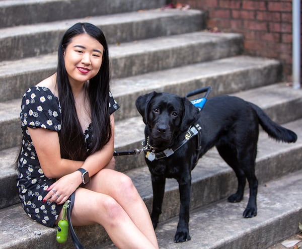 Portrait of Legally blind Georgia Tech student, Nola Timmins, with her guide dog and best friend, Brizzy. PHIL SKINNER FOR THE ATLANTA JOURNAL-CONSTITUTION.


 