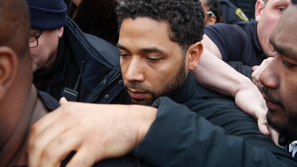 In this Feb. 21, 2019 file photo, Jussie Smollett leaves George N Leighton Criminal Courthouse in Chicago. A lawyer for Smollett is asking a judge to allow the "Empire" actor to travel while he is free on bond on charges he falsely reported being attacked by two masked men. (AP Photo/Kamil Krzaczynski, File)