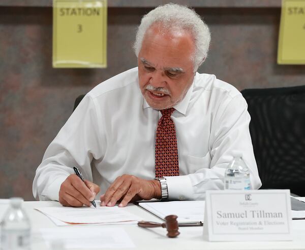 Nov 13, 2018 Decatur: Samuel Tillman is the first to sign his name after the DeKalb County Elections Board voted unanimously to certify it's election results at the DeKalb County Elections office on Tuesday, Nov. 13, 2018, in Decatur.  Curtis Compton/ccompton@ajc.com