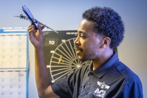 Chief Ground Instructor Malcolm Robinson lectures about a plane's weight and balance during class at the Aviation Career Enrichment Academy on Saturday, April 20, 2024. (Steve Schaefer / AJC)