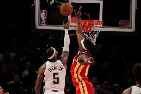 in the first half of an NBA basketball game against the Tuesday, March 4, 2025, in Atlanta. (AP Photo/Brynn Anderson)