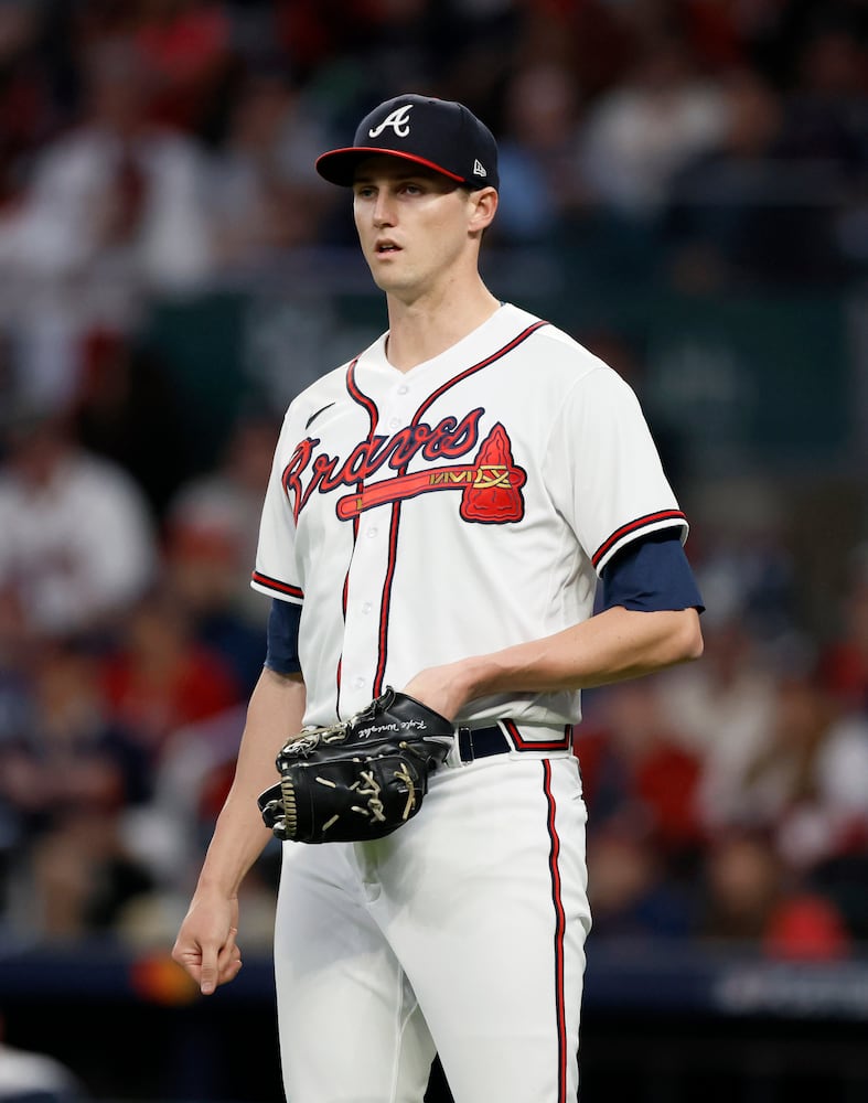 Atlanta Braves starting pitcher Kyle Wright (30) reacts after giving up a double to Philadelphia Phillies designated hitter Bryce Harper during the second inning of game two of the National League Division Series baseball game at Truist Park in Atlanta on Wednesday, October 12, 2022. (Jason Getz / Jason.Getz@ajc.com)