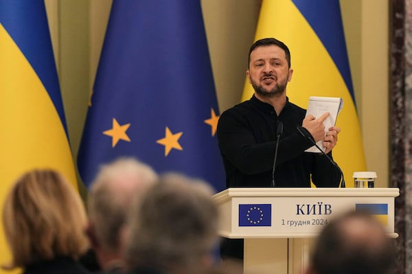 Ukraine's President Volodymyr Zelenskyy speaks during a joint press conference with European Council President Antonio Costa, in Kyiv, Ukraine, Sunday, Dec. 1, 2024. (AP Photo/Evgeniy Maloletka)