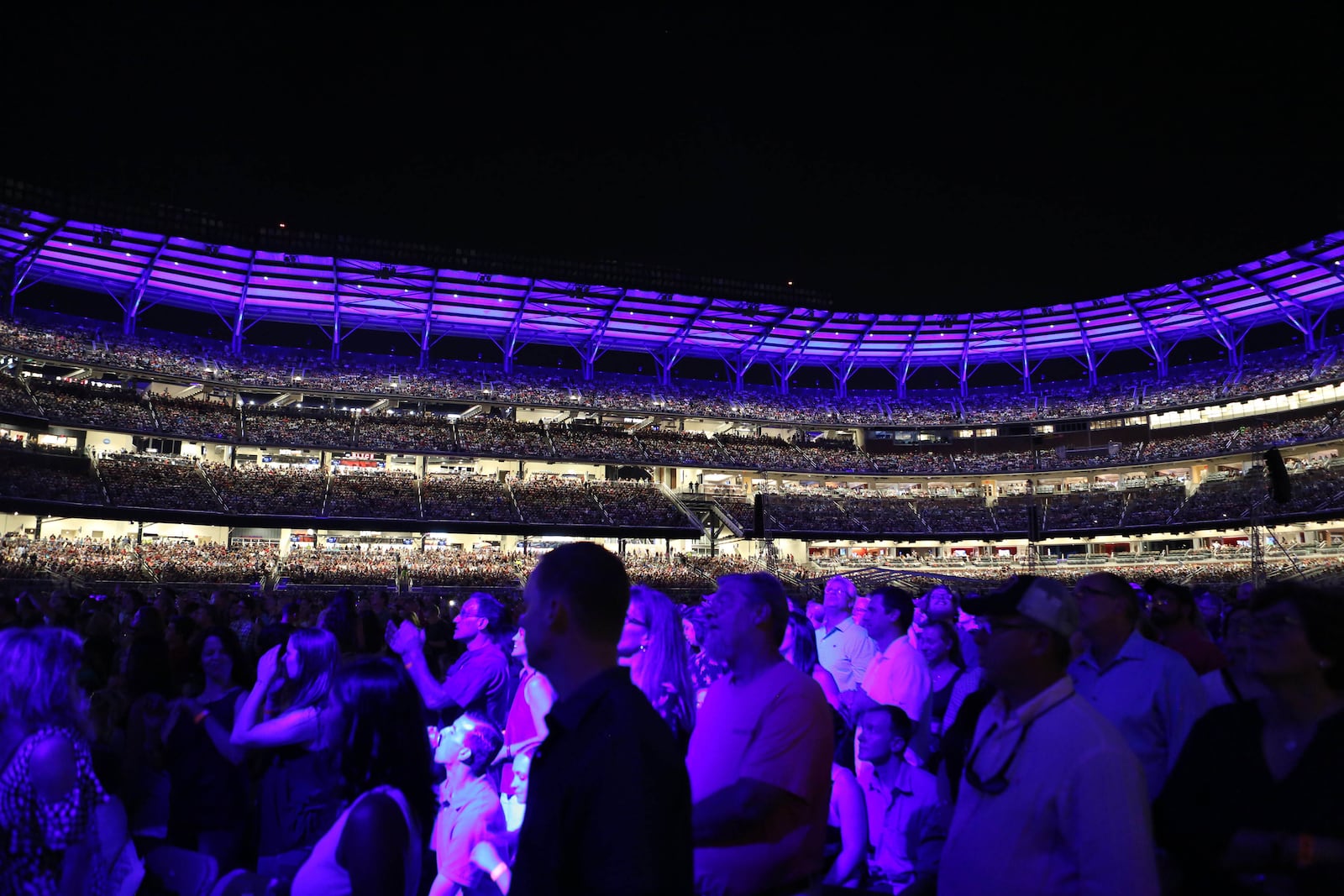  Fans on the field level of SunTrust Park sing along to Billy Joel. Photo: Robb Cohen Photography & Video