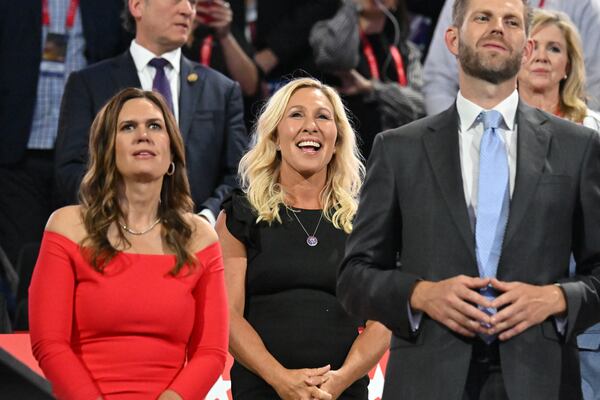 U.S. Rep. Marjorie Taylor Greene, center, delivered a red-meat speech to delegates Monday at the Republican National Convention. She has lobbied to become the secretary of homeland security if Donald Trump wins the November election. (Hyosub Shin / AJC)