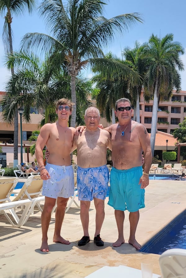 Jason Aussin (left), 20, saved his grandfather's life by administering CPR on a golf course July 24. Courtesy of Kathy Aussin