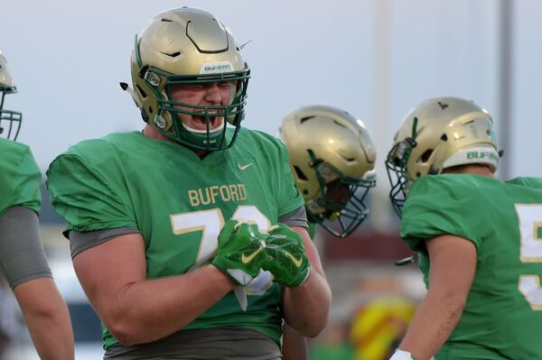 8/24/18 - Buford - Buford football player Harry Miller celebrates after Buford scored a touchdown against Jonesboro High School at the Buford City Schools football stadium on Friday, August 25. Jenna Eason / Jenna.Eason@coxinc.com