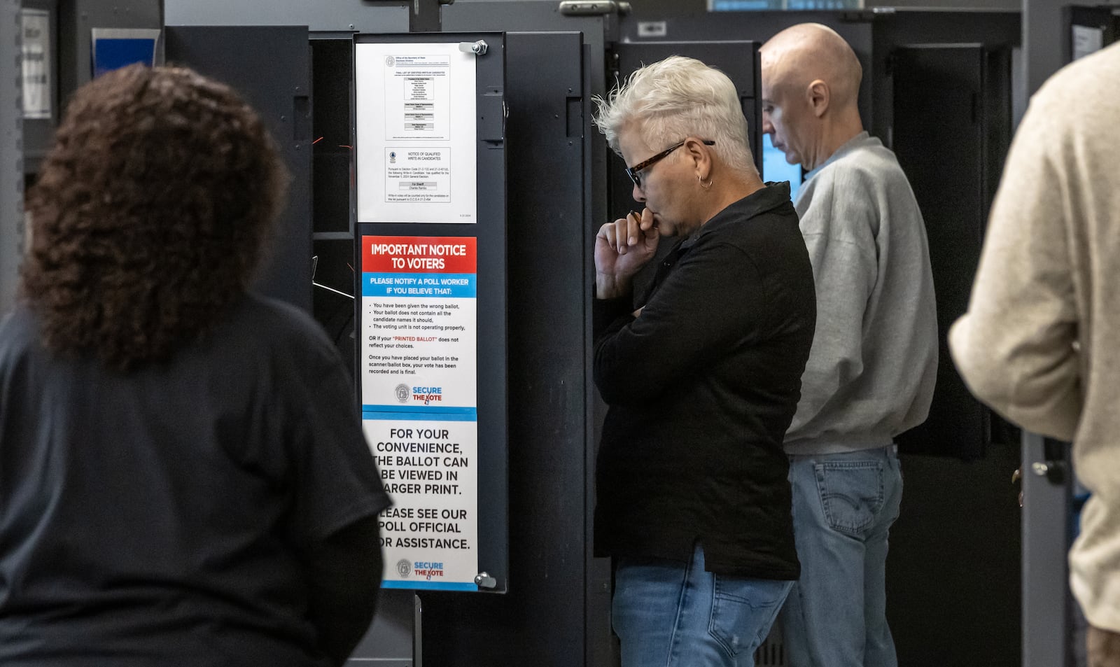 Michelle Kiepper (center) voted at the Joan P. Garner Library in Atlanta last week.