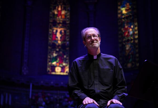 The Rev. David Peck, rector of St. James Episcopal Church, leads a "Contemplative Citizenship" service in Lancaster, Pa., on Tuesday, Oct. 15, 2024. (AP Photo/Jessie Wardarski)