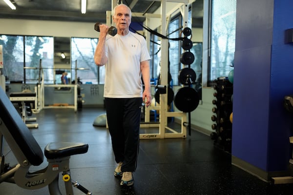 Dr. Grover Smith works out at STEPS Fitness, Wednesday, Feb. 12, 2025, in Nashville, Tenn. (AP Photo/George Walker IV)