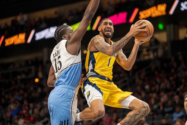 Indiana Pacers forward Obi Toppin (1) goes to the basket during the first half of an NBA basketball game between the Atlanta Hawks, Saturday, Mar. 8, 2025, in Atlanta. (AP Photo/Erik Rank)