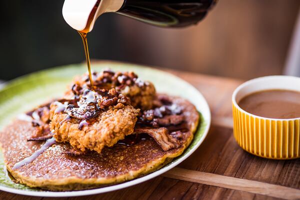  The Shoo Mercy Pancake is Tupelo Honey Cafe's spin on chicken and waffles, featuring a sweet potato pancake, whipped peach butter, spiced pecans, buttermilk fried chicken, apple cider bacon and maple syrup. / CONTRIBUTED BY: Tupelo Honey Cafe