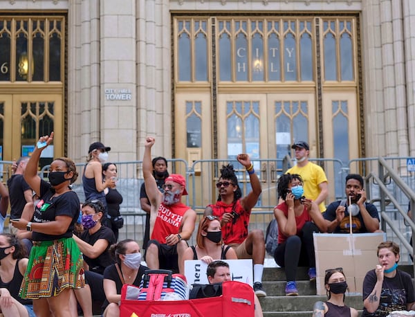 Protestors gather outside Atlanta City Hall.