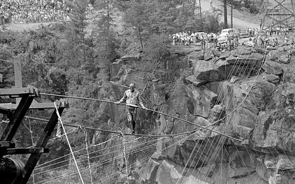 In this July 18, 1970, file photo, high-wire artist Karl Wallenda nears the end of his walk across the gorge, 750 feet above, at Tallulah Falls, Georgia. Wallenda’s grandson, Nik, will attempt a wire walk over an active volcano. 