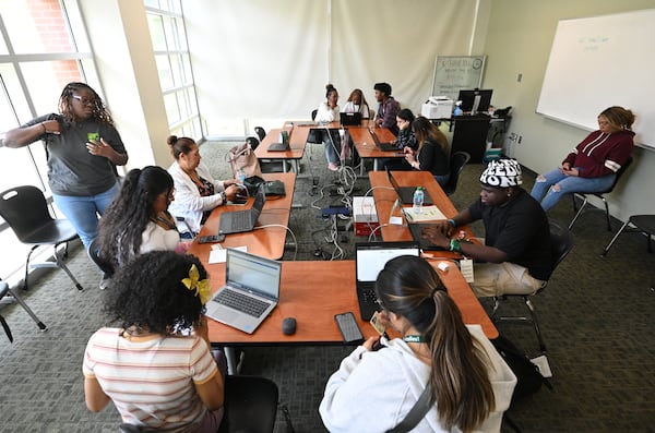 Students and parents get help with filling out FAFSA forms at the FAFSA Completion Center at Georgia Gwinnett College on Wednesday, June 12, 2024, in Lawrenceville. (Hyosub Shin / AJC)