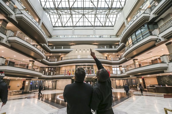 March 23, 2018 Atlanta: Employees at Atlanta City Hall were handed instructions as they come through the front doors to not turn on computers or log on to their workstations on Friday March 23, 2018. Friday&apos;s action comes as city officials are struggling to determine how much sensitive information may have been compromised in a Thursday cyber attack. The city has also received demands that it pay a ransom of an unspecified amount, officials confirmed. But officials had yet to make a determination if it would pay the ransom. Hartsfield-Jackson International took down the wi-fi at the world&apos;s busiest airport after a cyber attack on the city. The Atlanta airport&apos;s website said after the cyber attack that security wait times and flight information may not be accurate. JOHN SPINK/JSPINK@AJC.COM