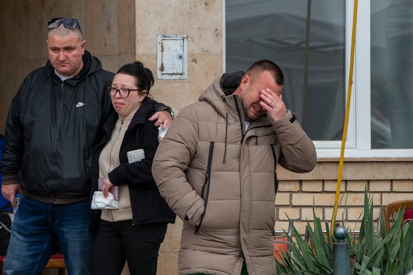 Relatives of victims leave a hospital in the town of Kocani, North Macedonia, Monday, March 17, 2025, following a massive fire in the nightclub early Sunday. (AP Photo/Visar Kryeziu)