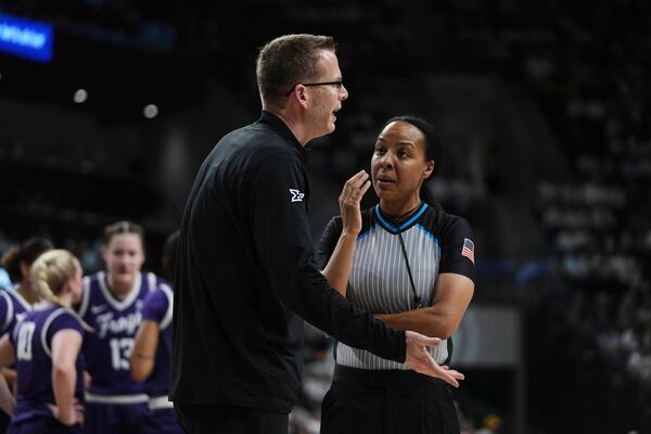 TCU head basketball coach Mark Campbell argues with an official in the second half of an NCAA college basketball game against Baylor in Waco, Texas, Sunday, March 2, 2025. (AP Photo/Tony Gutierrez)