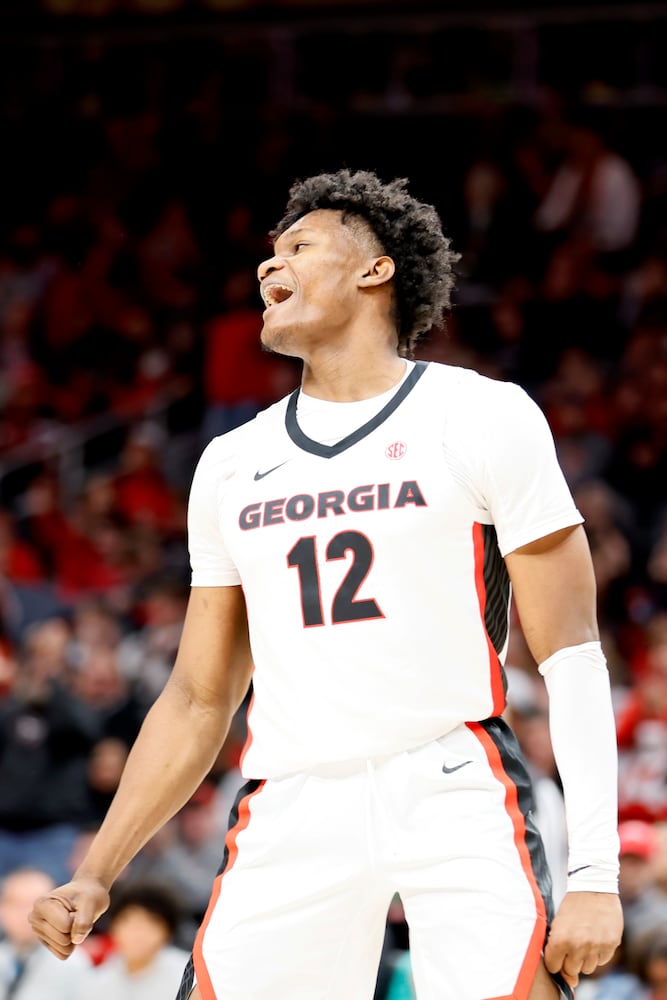 Bulldogs forward Matthew-Alexander Moncrieffe reacts after scoring a basket against the Fighting Irish during the first half Sunday night at State Farm Arena. (Miguel Martinez / miguel.martinezjimenez@ajc.com)