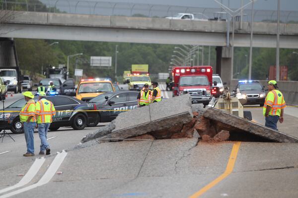  April 17, 2017, Atlanta, Georgia - Crews assess damage to I-20 in the west bound lanes in Atlanta, Georgia (HENRY TAYLOR /AJC.COM)