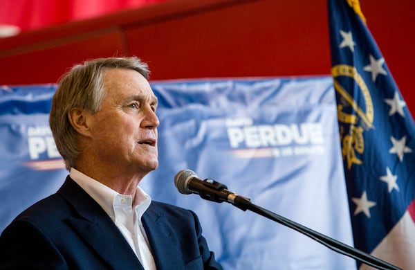 Senator David Perdue holds a rally at Peachtree DeKalb Airport with SC Senator Tim Scott, not pictured, on Monday, Nov 2, 2020.  (Jenni Girtman for The Atlanta Journal-Constitution)