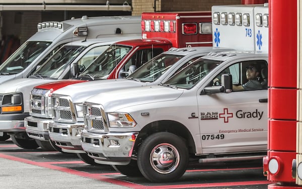 Ambulances are lined up at Grady Hospital in Atlanta. JOHN SPINK/JSPINK@AJC.COM