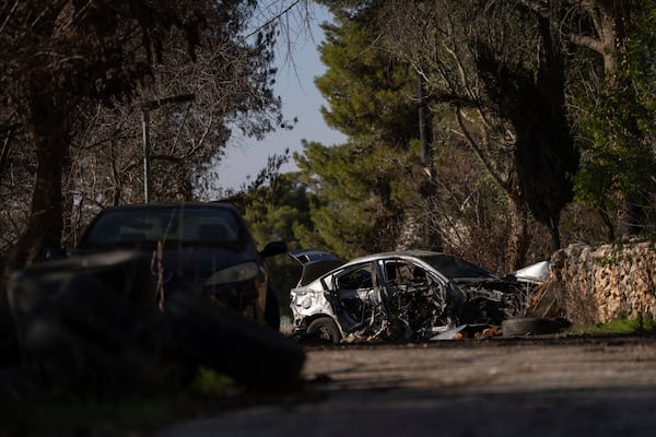 A view of a damaged car in the Kibbutz Manara, which is located near to the border with Lebanon, in northern Israel, Monday Dec, 2, 2024. (AP Photo/Ohad Zwigenberg)