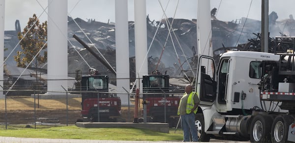 Rockdale County residents, especially those with respiratory problems, were told to shelter in place again Tuesday if the large cloud of smoke from a Conyers chemical plant fire moved into their vicinity. 