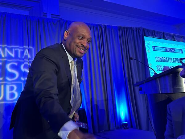 Corey G. Johnson, a Pulitzer-Prize winning Atlanta journalist, after being inducted into The Atlanta Press Club Hall of Fame induction on Nov. 16, 2023 in Buckhead. RODNEY HO/rho@ajc.com