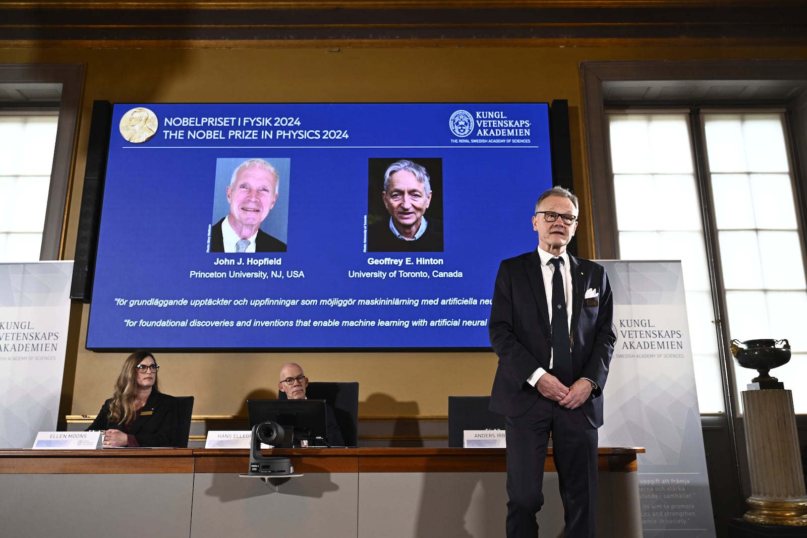 Professor Anders Irbäck explains the work of John Hopfield and Geoffrey Hinton after being awarded the 2024 Nobel Prize in Physics at a press conference at the Royal Swedish Academy of Sciences in Stockholm, Sweden Tuesday Oct. 8, 2024. (Christine Olsson/TT News Agency via AP)