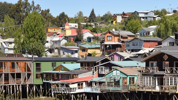 Colorful palafitos (stilt houses) in the city of Castro, Chile, line the waterfront. (Mark Johanson/Chicago Tribune/TNS)