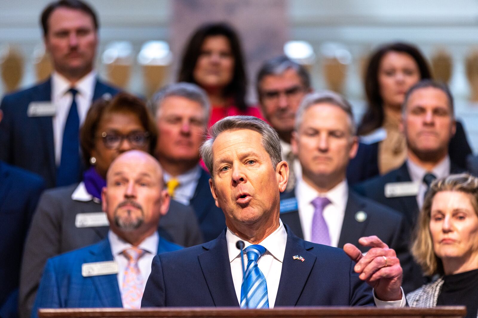 Gov. Brian Kemp speaks about the budget bill at the Capitol on Monday, March 13, 2023. The new fiscal year begins Saturday, when the $32.4 billion budget lawmakers passed earlier this year — complete with pay raises for about 250,000 educators and state employees — will take effect. (Arvin Temkar/The Atlanta Journal-Constitution)