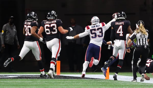 Patriots linebacker Kyle Van Noy intercepts Falcons backup quarterback Josh Rosen and returns it for a touchdown to take a 25-0 lead during the final minutes of the 4th quarter in a NFL football game on Thursday, Nov. 18, 2021, in Atlanta. The Patriots beat the Falcons 25-0.   “Curtis Compton / Curtis.Compton@ajc.com”